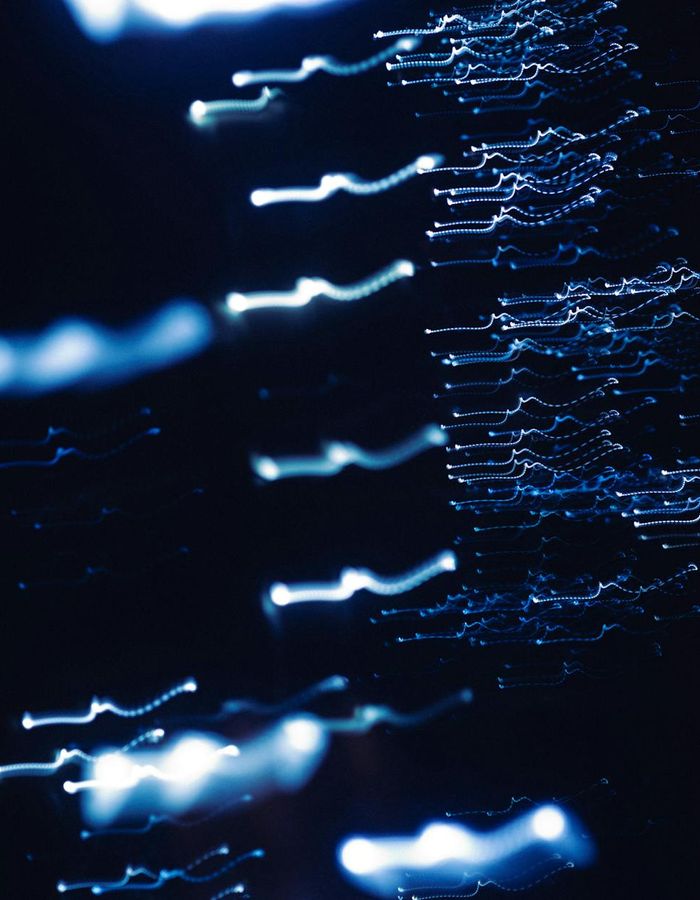 Abstract blue light patterns representing body flexibility and energy flow